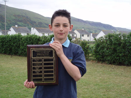 Eamonn Kearns with the N. Antrim INTO Hurling Player of the Tournament Award.